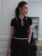 Lavinque Tops Polo Ajusté Blanc à Détails Noirs | Zippé & Chic | Élégance Moderne