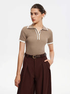 Lavinque Tops Polo Ajusté Blanc à Détails Noirs | Zippé & Chic | Élégance Moderne